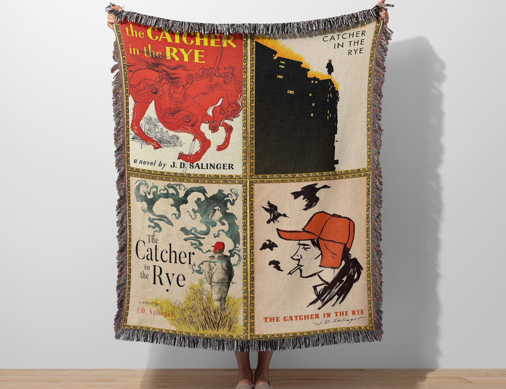 The Catcher in the Rye woven throw blanket showing four classic cover designs including the carousel horse