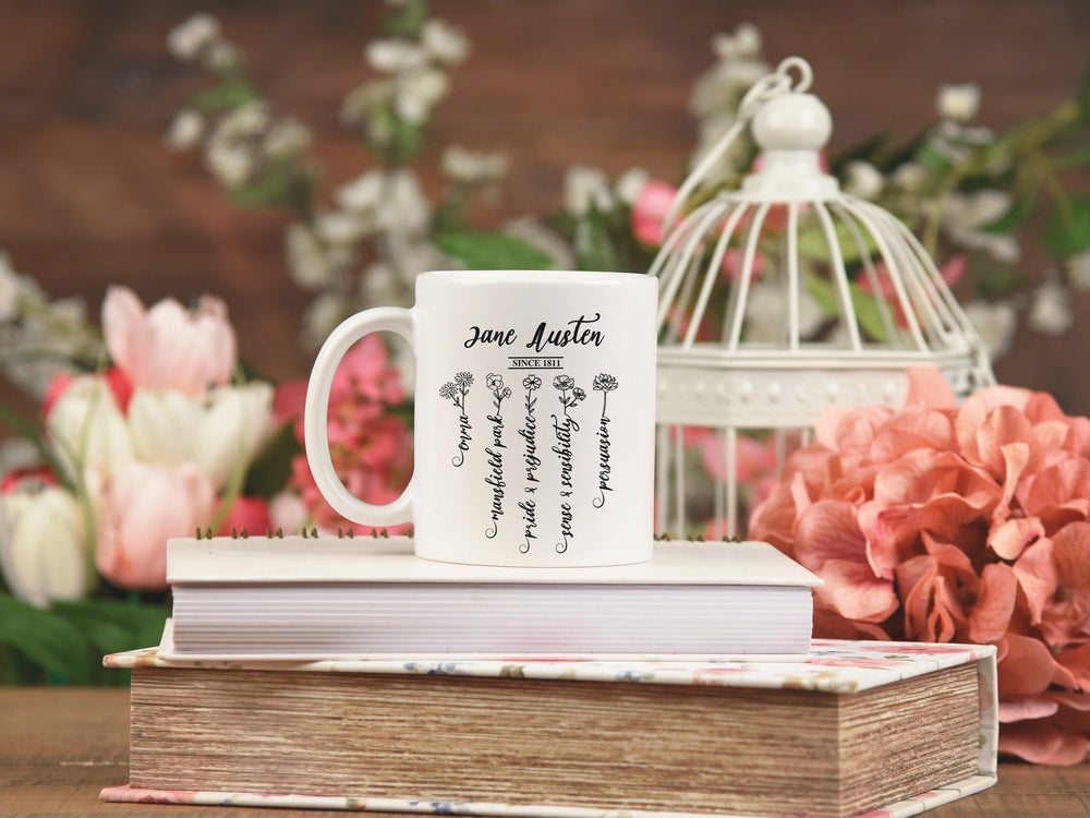 Jane Austen wildflower mug with five novel titles drawn as flower stems