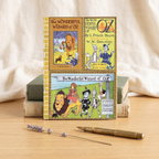 Wizard of Oz hardcover notebook featuring vintage L. Frank Baum book covers of Dorothy and friends, a journal gift for Oz book fans